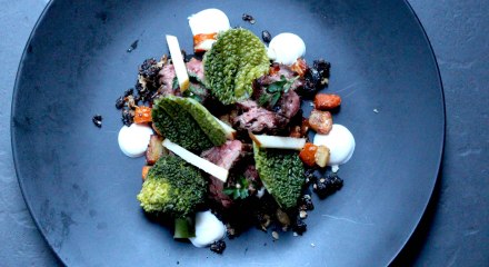 Steak with beef jam, black pudding crumble and savoy cabbage